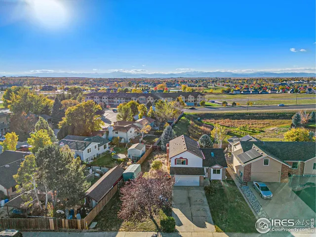 an aerial view of a house with a outdoor space