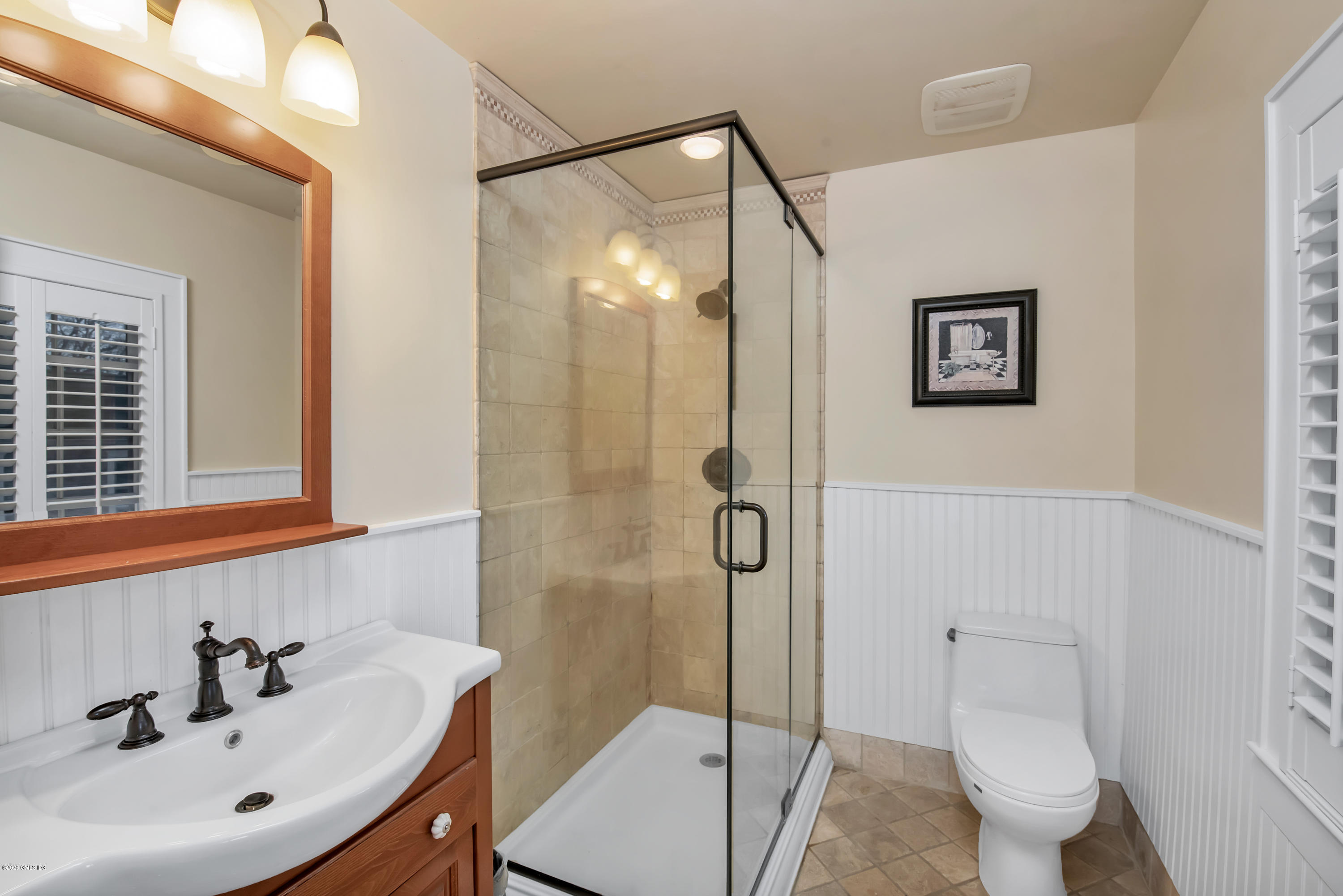 18 Stuart Drive Old Greenwich, CT 06870 - Photo 12 of 25 a bathroom with a sink and toilet
