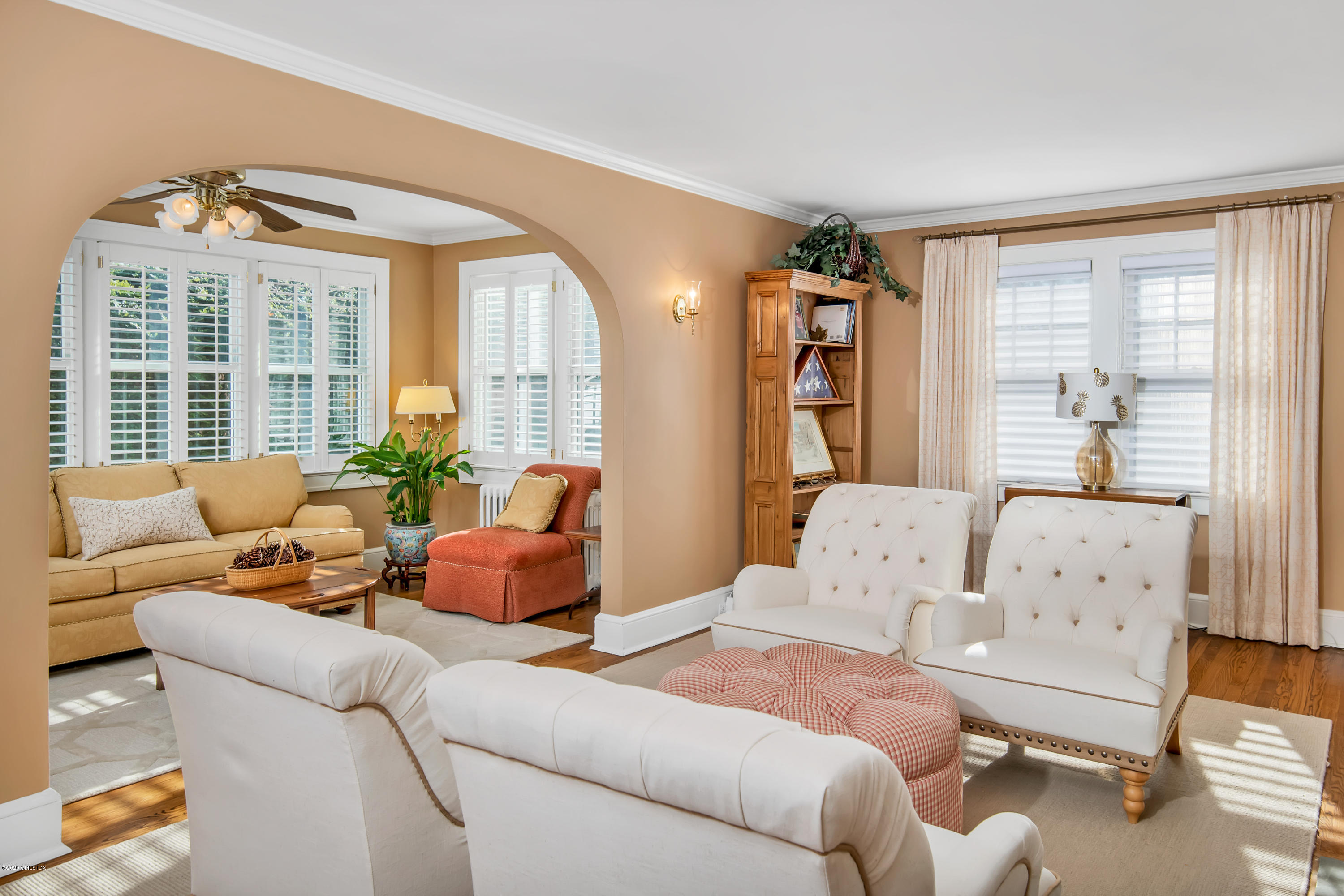 18 Stuart Drive Old Greenwich, CT 06870 - Photo 2 of 25 a living room with furniture and a large window