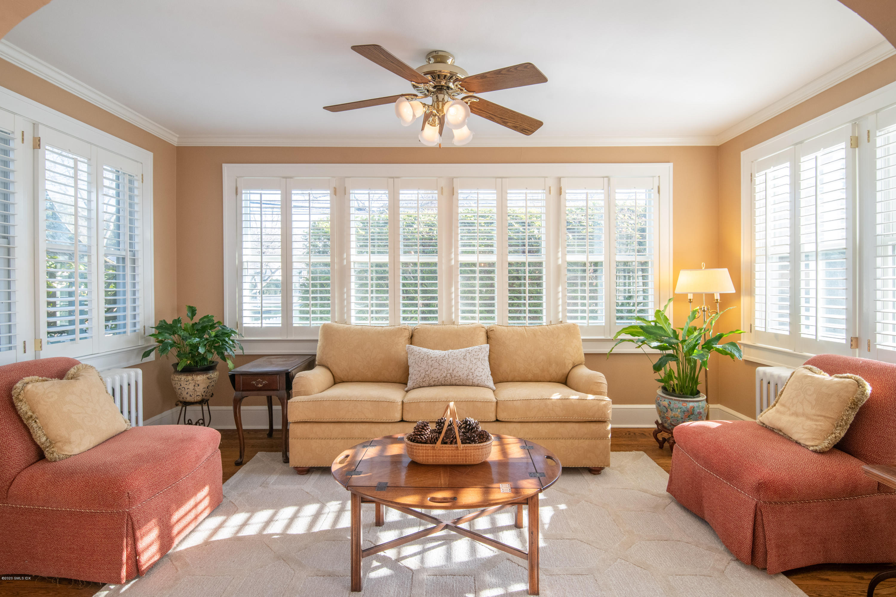 18 Stuart Drive Old Greenwich, CT 06870 - Photo 4 of 25 a living room with furniture and a large window