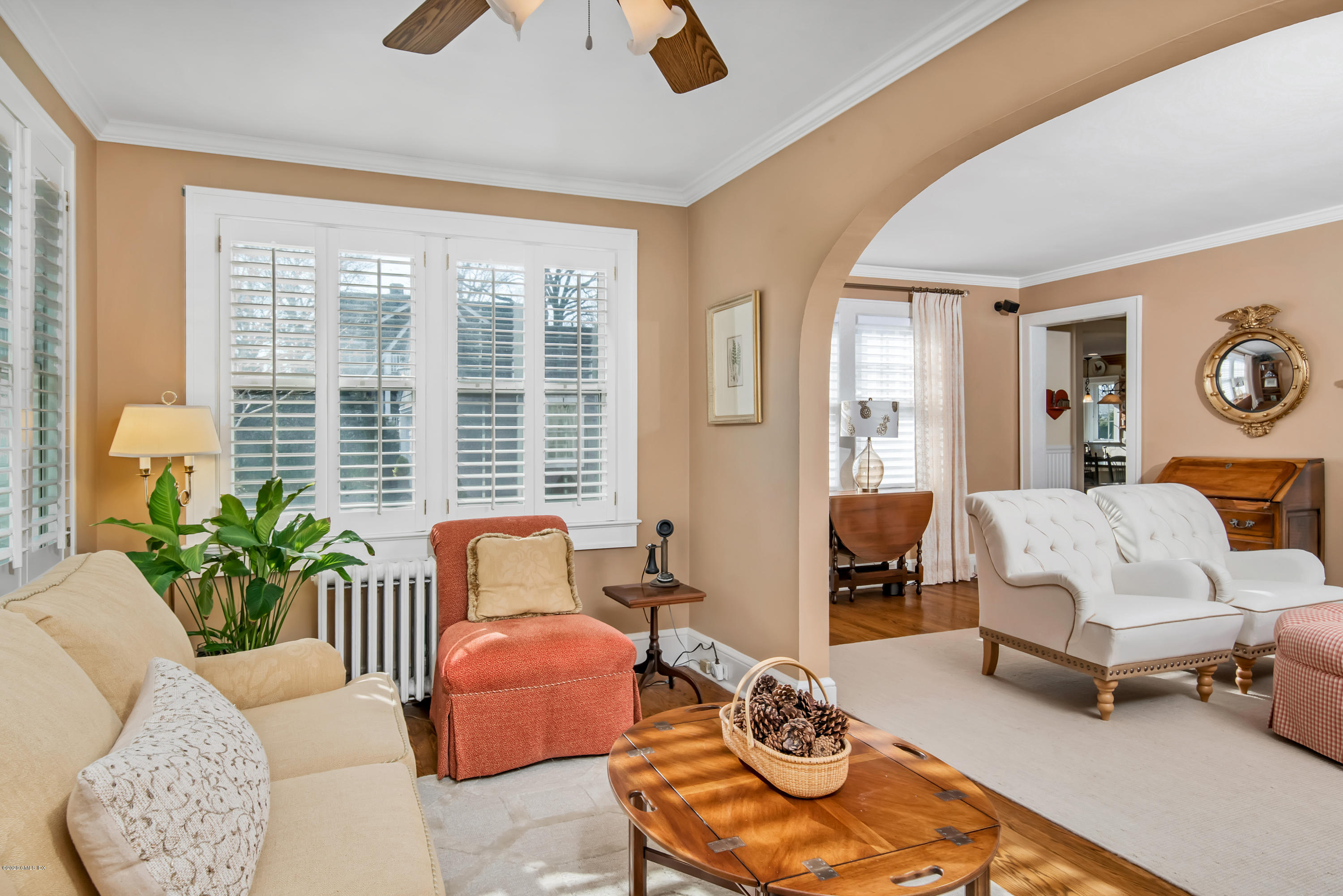 18 Stuart Drive Old Greenwich, CT 06870 - Photo 25 of 25 a bedroom with furniture and a large window