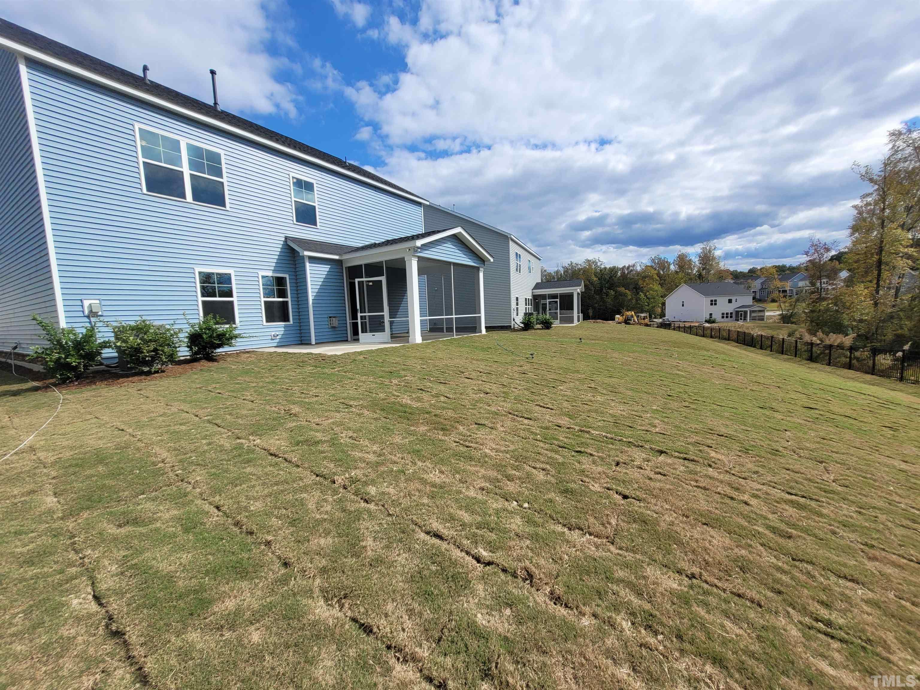 124 Trailing Bluff Way Garner, NC 27529 - Photo 6 of 21 a big house with a big yard and large trees