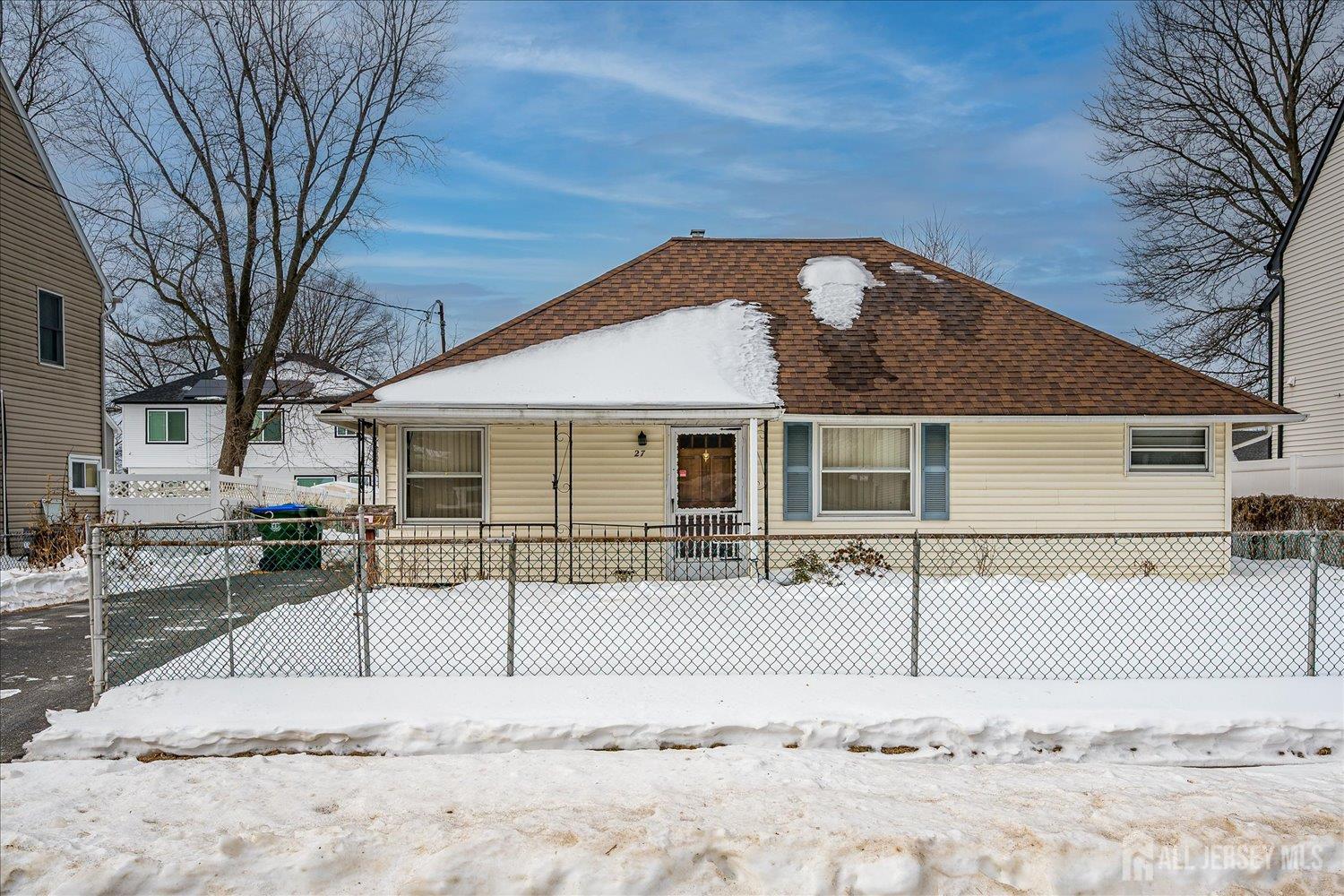 27 Stiles Road Edison, NJ 08817 - Photo 1 of 20 a view of a white house