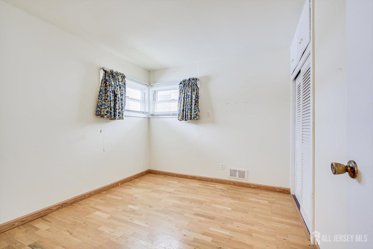 27 Stiles Road Edison, NJ 08817 - Photo 11 of 20 an empty room with windows