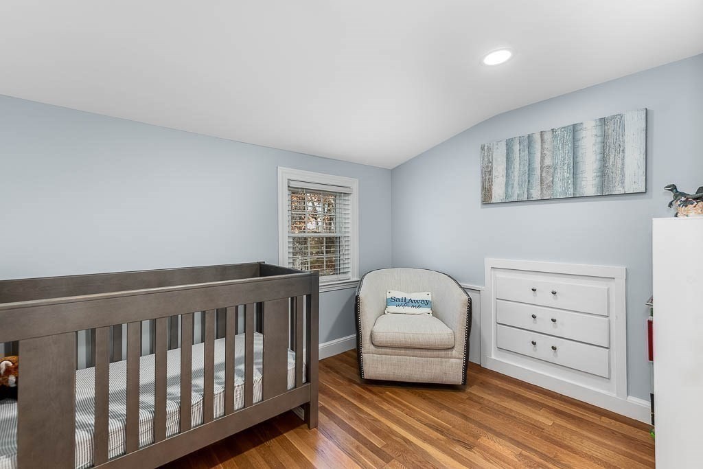 61 Ledgewood Road Dedham, MA 02026 - Photo 12 of 23 a bedroom with furniture and a window