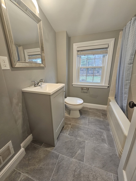 61 Ledgewood Road Dedham, MA 02026 - Photo 15 of 23 a bathroom with a sink toilet and window