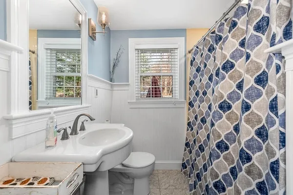 a bathroom with a sink and a toilet
