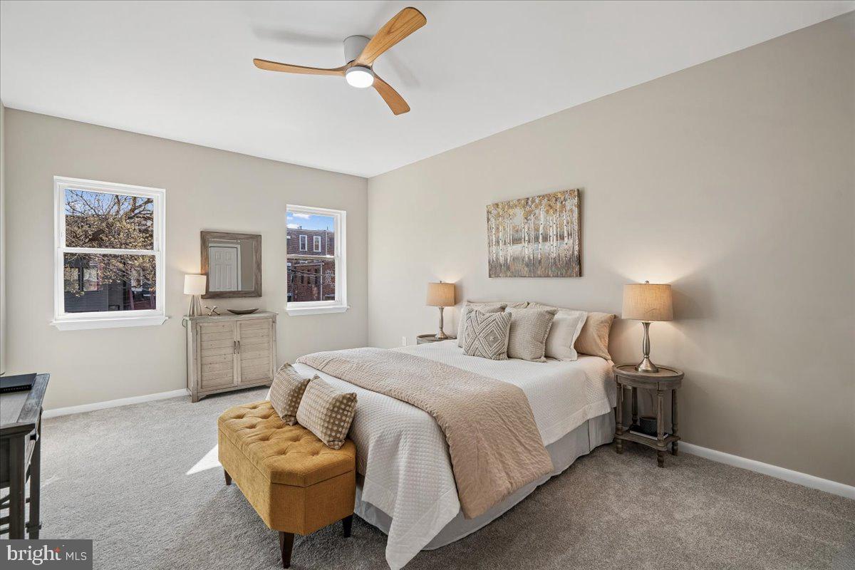 817 4th Street Northeast Washington, DC 20002 - Photo 20 of 40 a bedroom with a bed and window