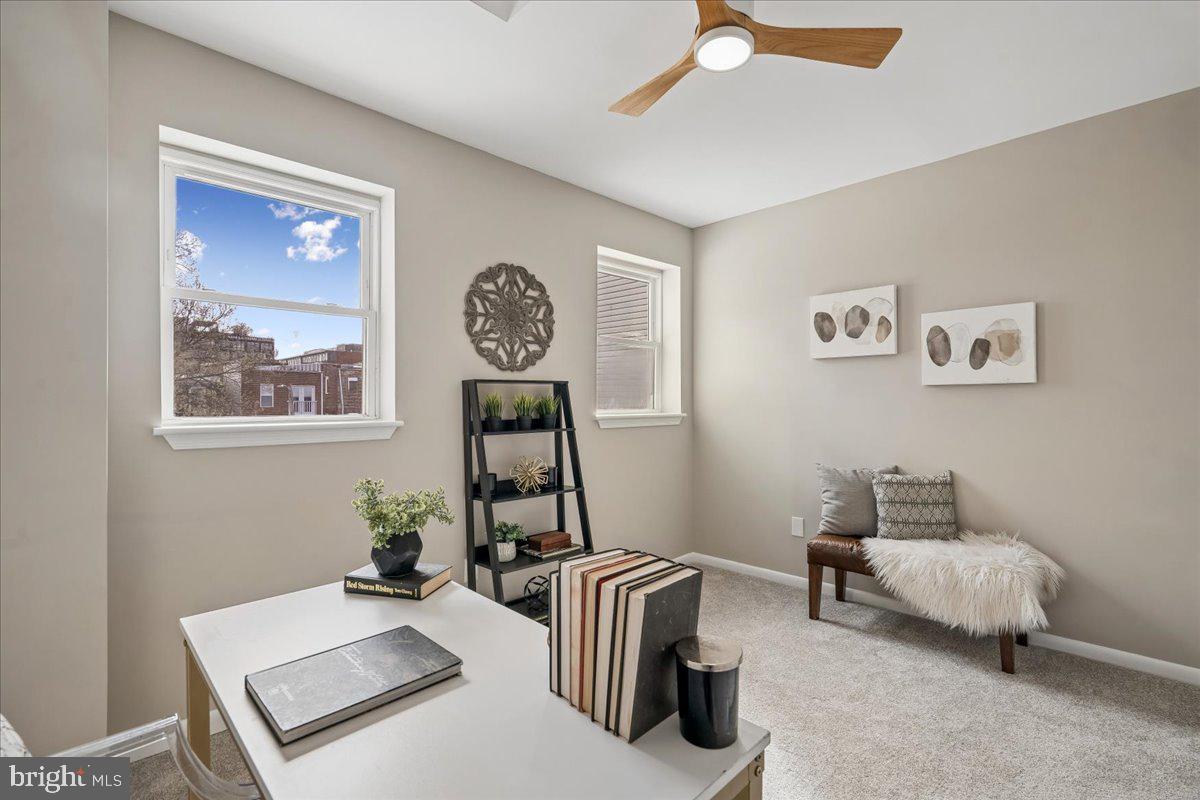 817 4th Street Northeast Washington, DC 20002 - Photo 29 of 40 a room with a bed and a table