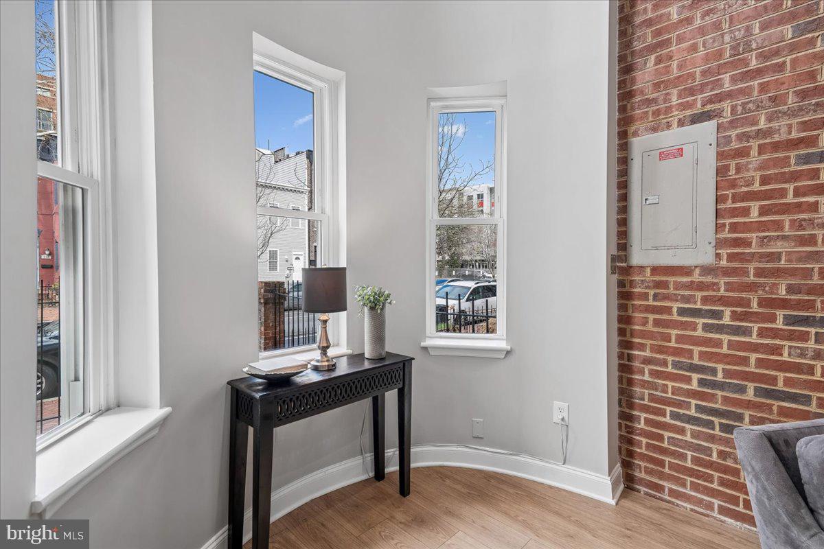 817 4th Street Northeast Washington, DC 20002 - Photo 3 of 40 a view of a workspace with furniture and a window