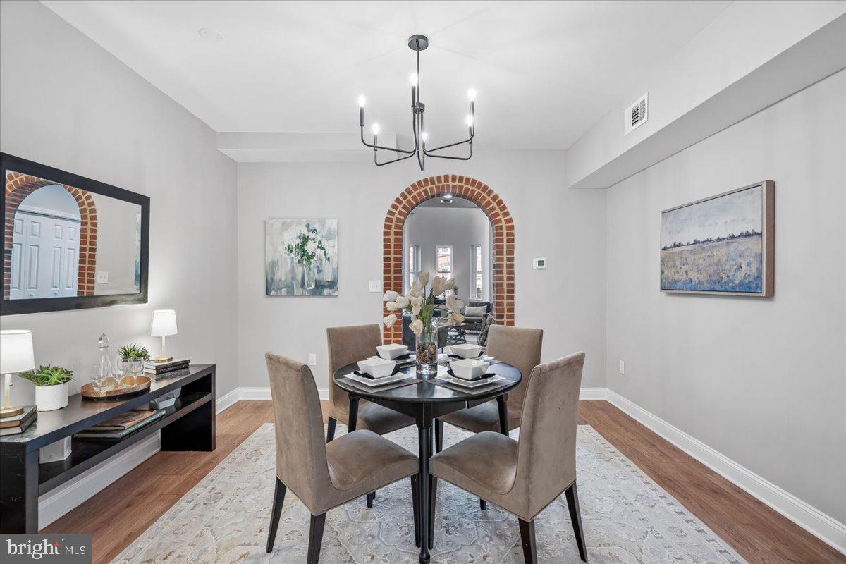 817 4th Street Northeast Washington, DC 20002 - Photo 9 of 40 a view of a dining room with furniture window and wooden floor