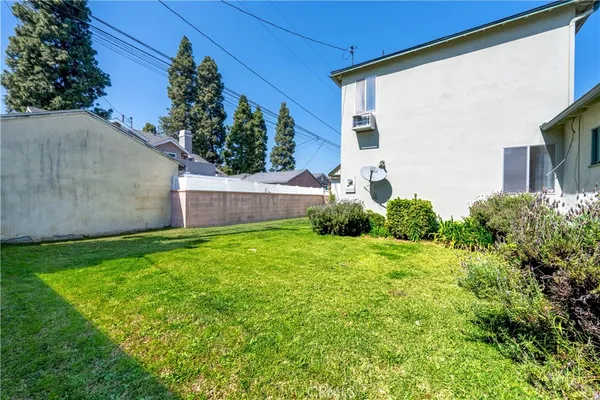a view of a backyard with plants