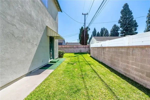 a view of a garden with a patio
