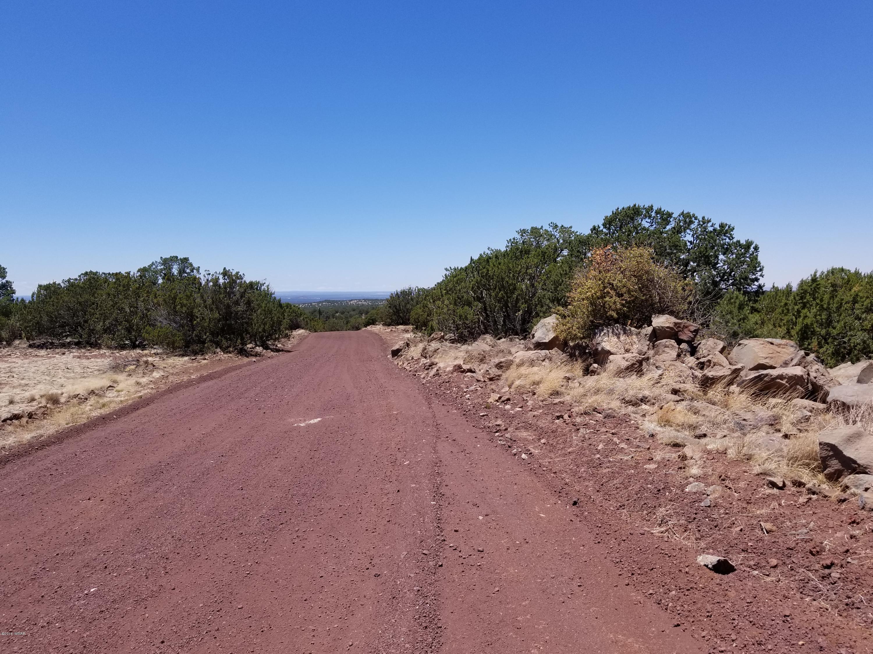 St-johns Az 85936 Concho, AZ 85924 - Photo 10 of 16 a view of a dirt road with a building in the background