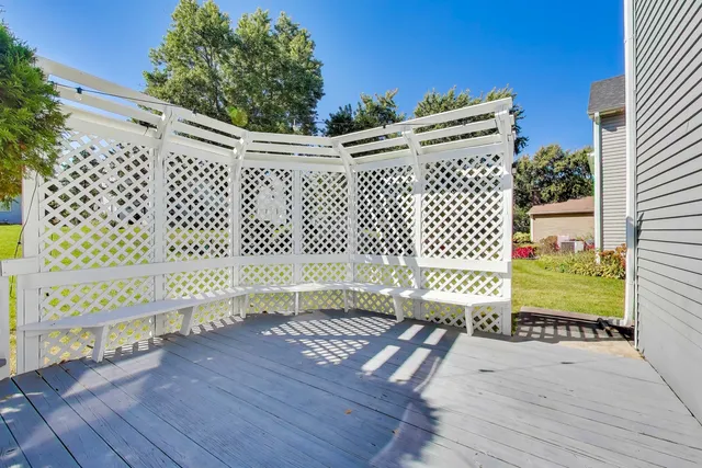 a view of a park with swings and slides