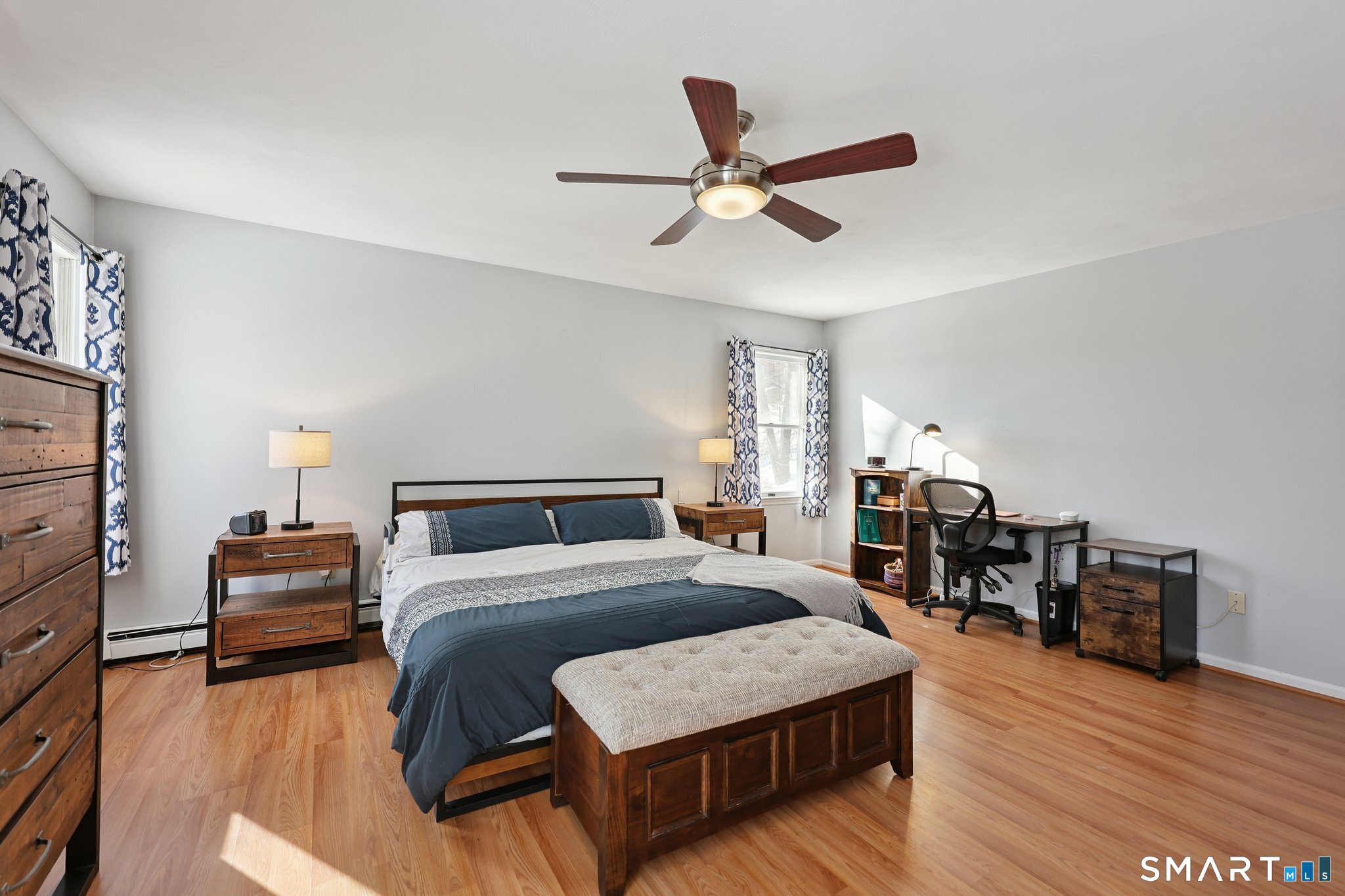 36 Bigelow Road New Fairfield, CT 06812 - Photo 14 of 37 Large primary bedroom with walk-in closet and newly renovated full bath.