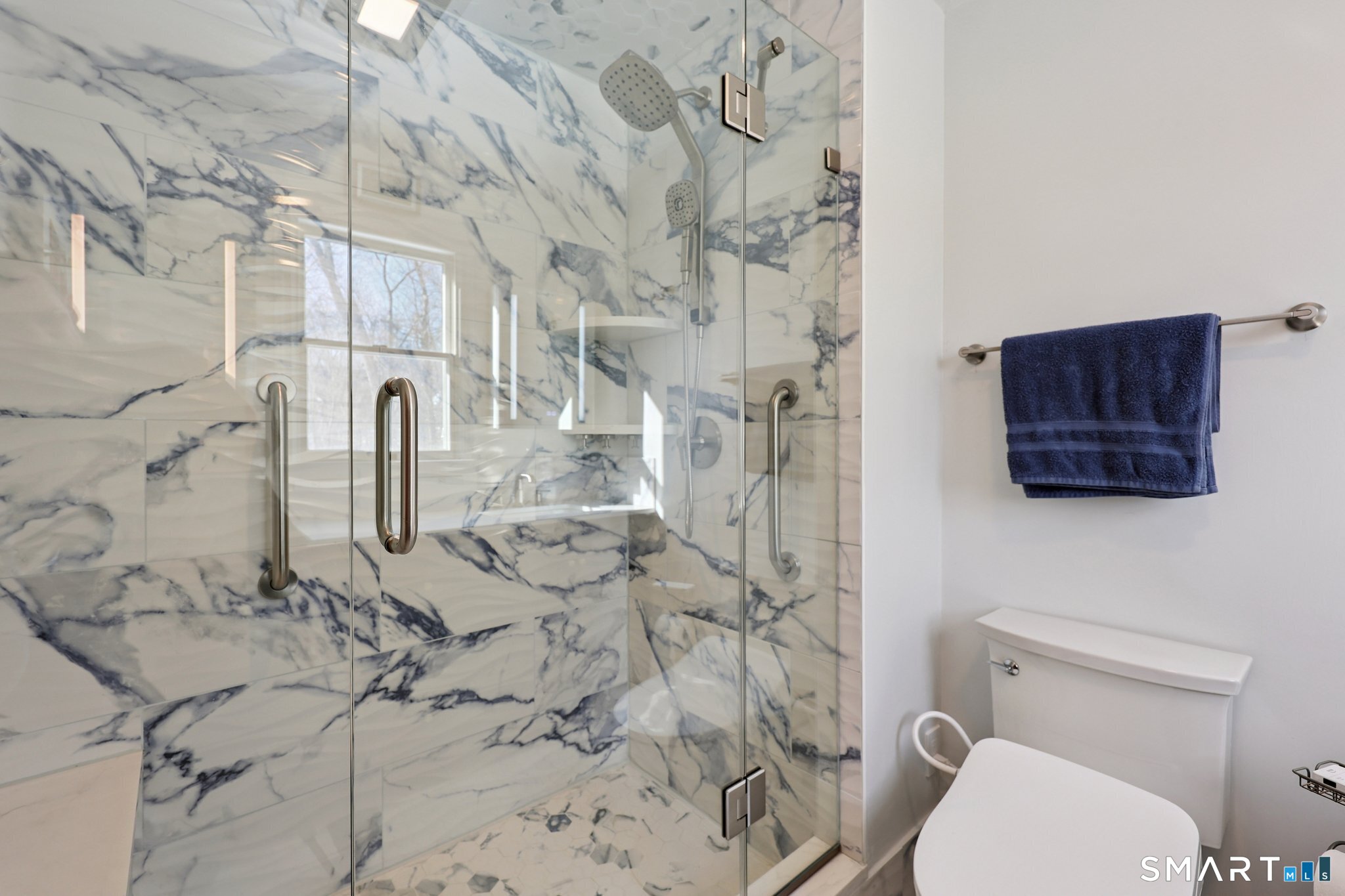 36 Bigelow Road New Fairfield, CT 06812 - Photo 17 of 37 Show stopper walk-in shower with glass doors.