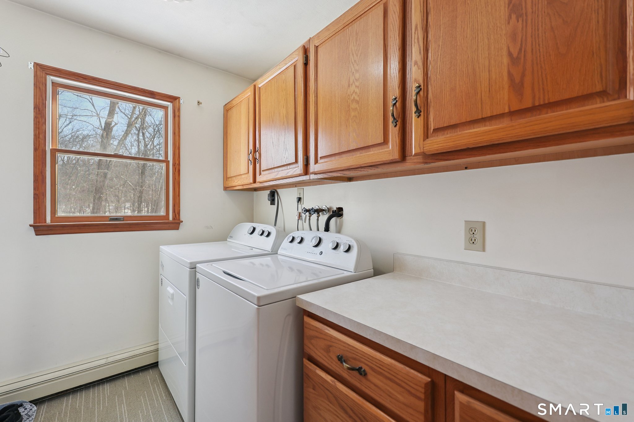 36 Bigelow Road New Fairfield, CT 06812 - Photo 21 of 37 Large laundry room on main level.