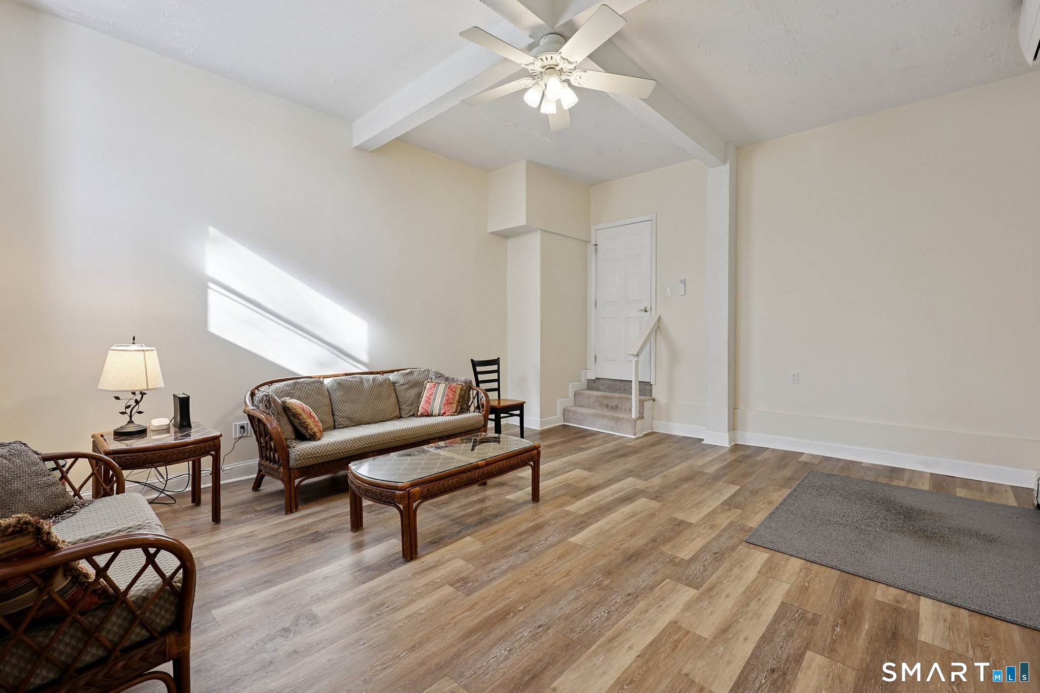 36 Bigelow Road New Fairfield, CT 06812 - Photo 23 of 37 Bedroom 3 on lower level leads to 3rd garage space. 10'+ ceiling in this room.