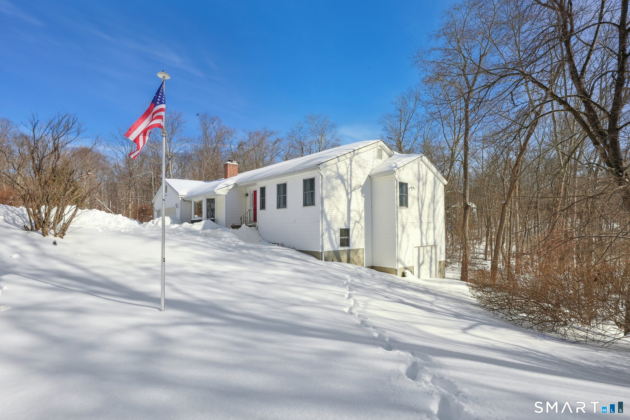 36 Bigelow Road New Fairfield, CT 06812 - Photo 31 of 37 See lower level garage space on right side of house. Perfect for your project car, your extra vehicles, studio, recreational toys, kayaks, etc.
