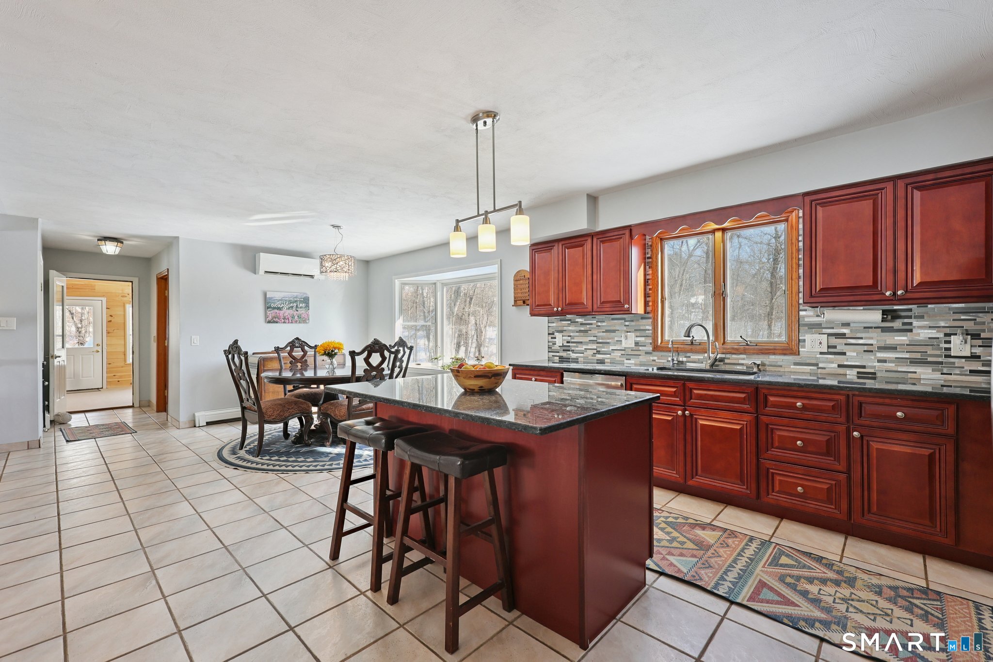 36 Bigelow Road New Fairfield, CT 06812 - Photo 8 of 37 Comfortable kitchen island for added dining space.