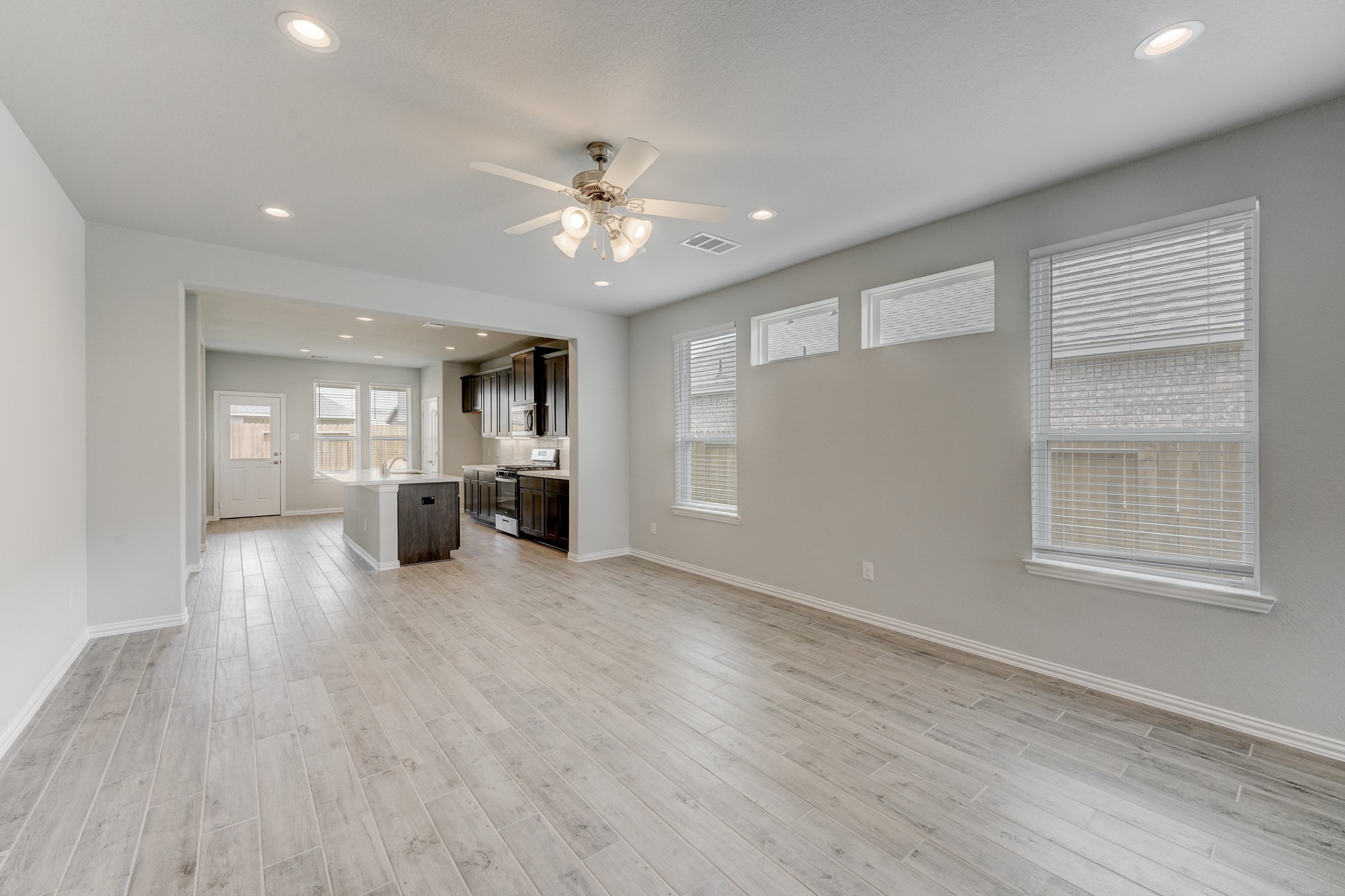 1229 Red Hills Drive Rosharon, TX 77583 - Photo 6 of 29 a view of empty room with wooden floor and window