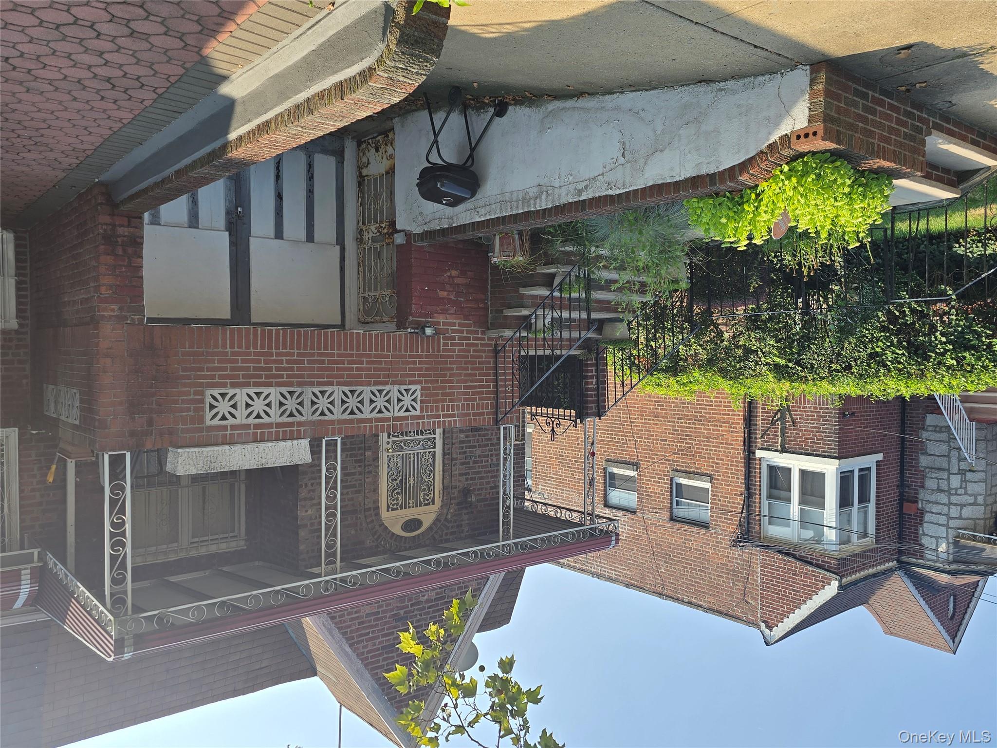 142 East 88th Street Brooklyn, NY 11236 - Photo 6 of 14 a view of a house with a yard