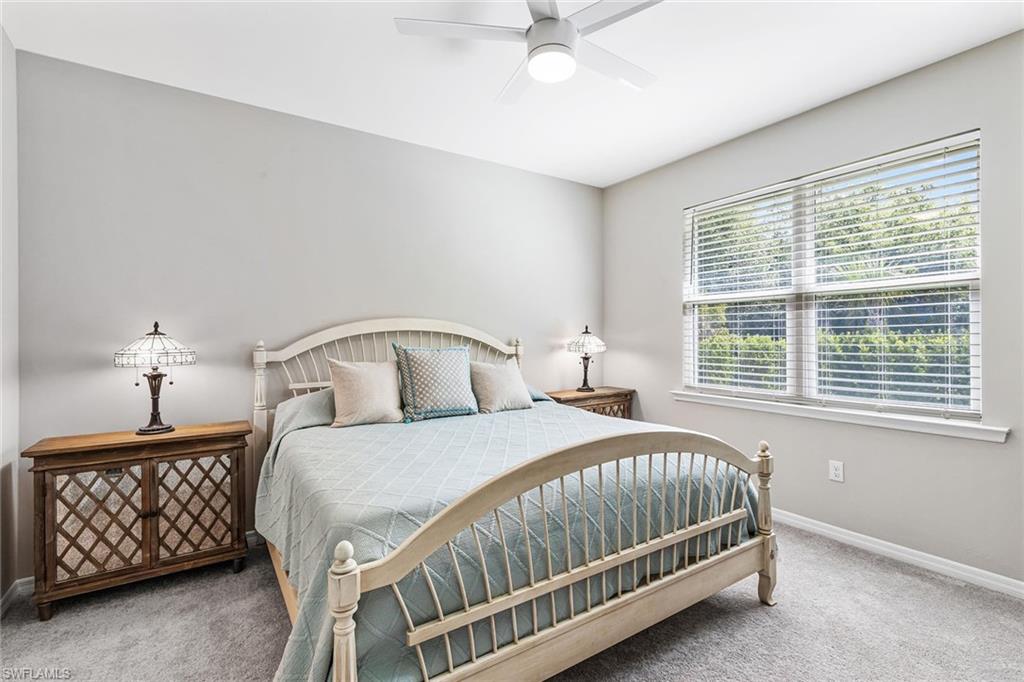 1252 Enbrook Loop Naples, FL 34114 - Photo 11 of 26 a bedroom with a bed and a window