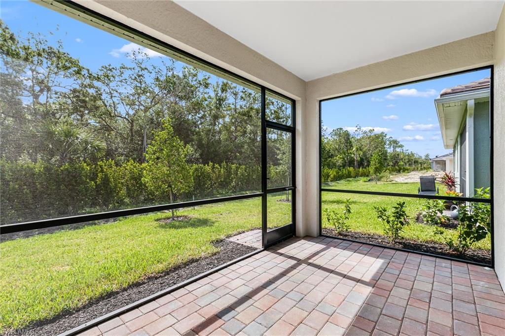 1252 Enbrook Loop Naples, FL 34114 - Photo 18 of 26 a view of balcony with yard