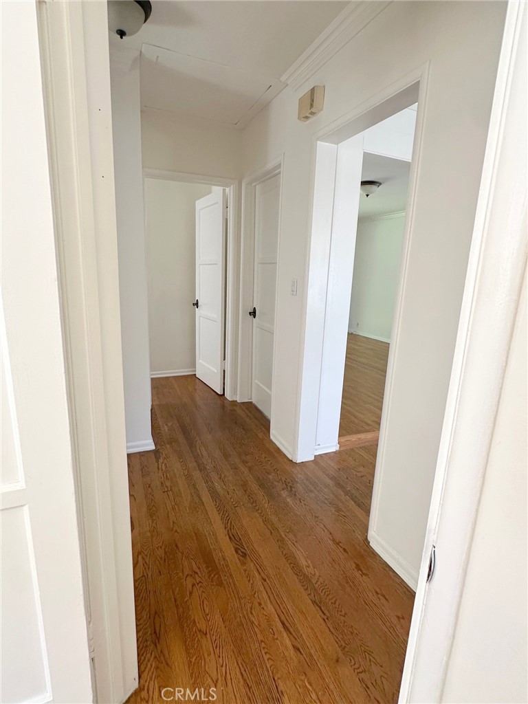 14722 Addison Street Sherman Oaks, CA 91403 - Photo 15 of 22 a view of a bathroom from a hallway