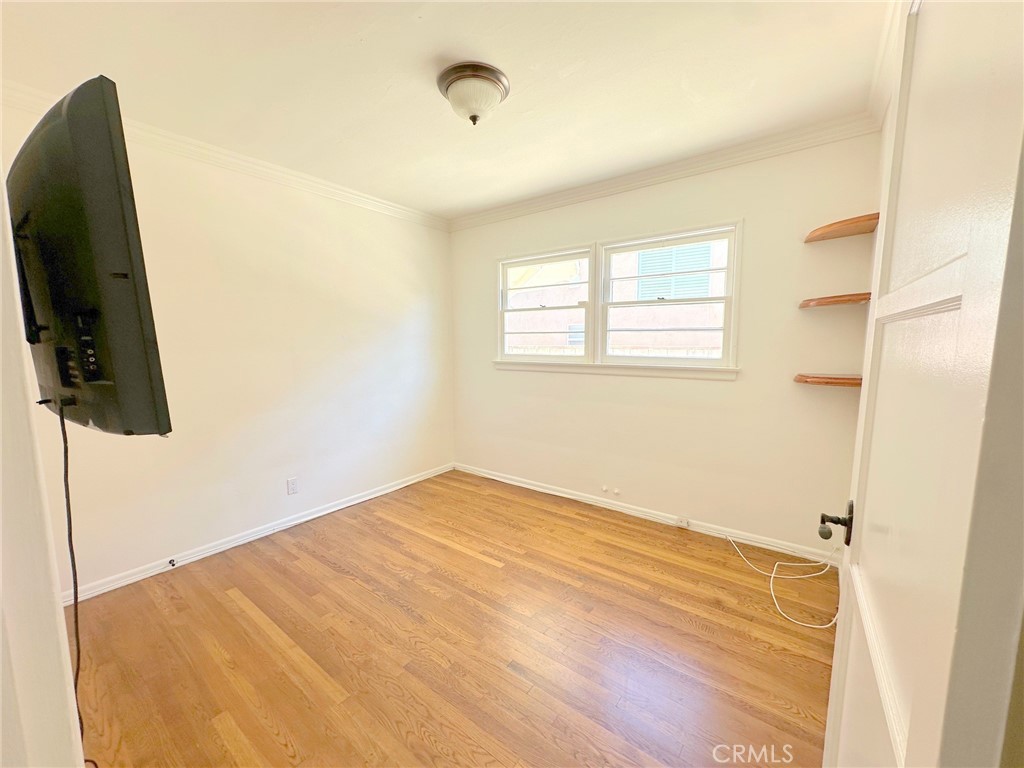 14722 Addison Street Sherman Oaks, CA 91403 - Photo 18 of 22 a view of empty room with ceiling fan