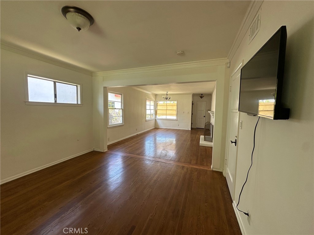 14722 Addison Street Sherman Oaks, CA 91403 - Photo 21 of 22 a view of livingroom with hardwood floor and window