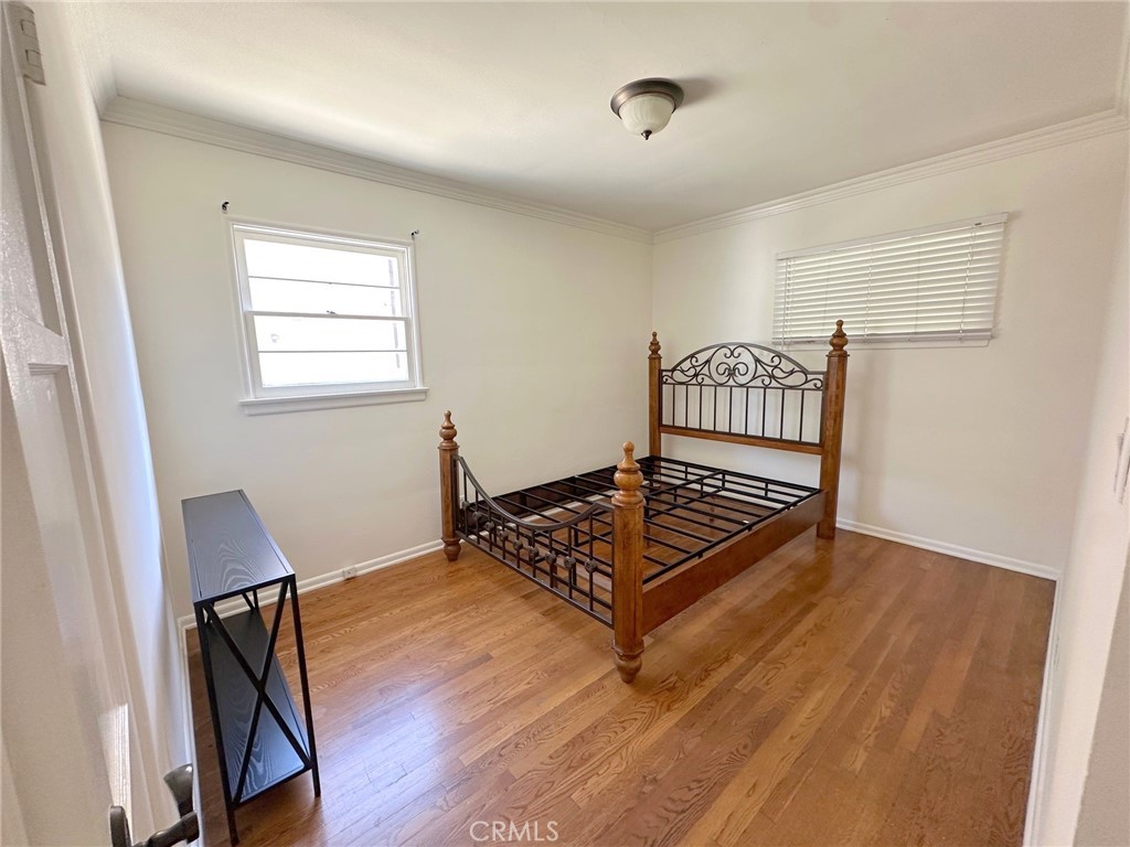 14722 Addison Street Sherman Oaks, CA 91403 - Photo 5 of 22 a view of workspace with window and wooden floor