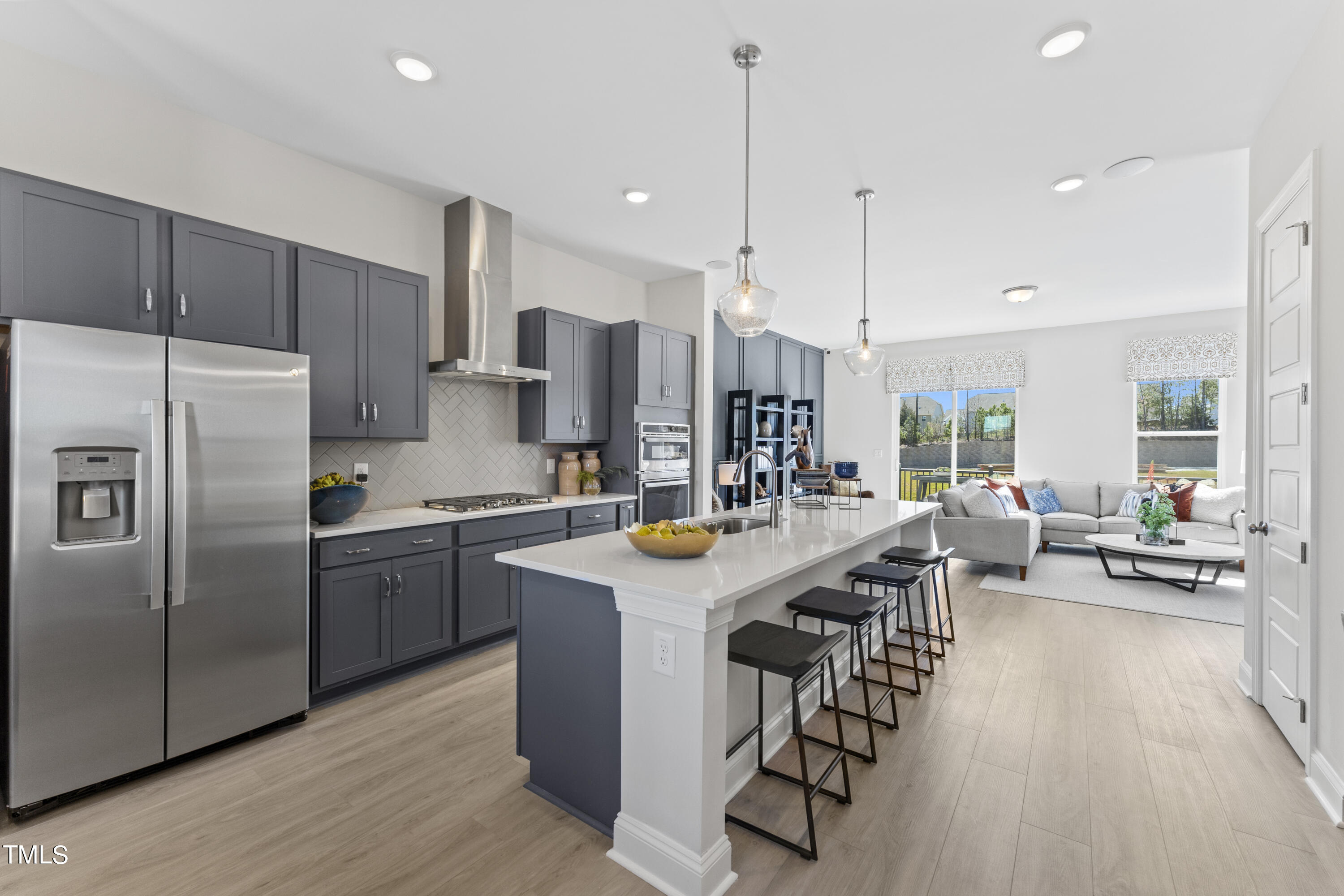 1304 Granholm Road Cary, NC 27519 - Photo 3 of 30 Kitchen to Living Room View