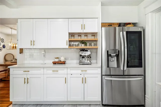 a room with furniture and wooden floor