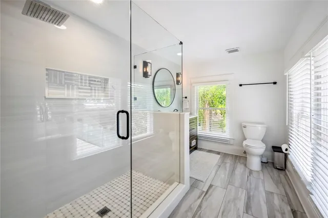 a bathroom with a sink and a shower