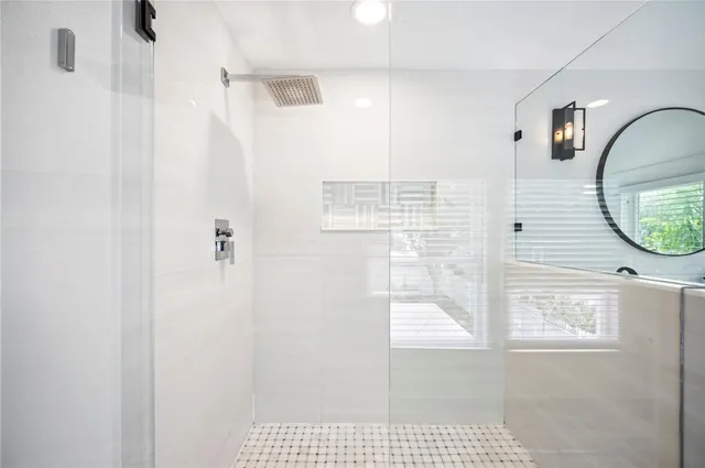 a view of a bathroom from the hallway