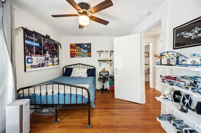 a bathroom with a bathtub a toilet and a shower