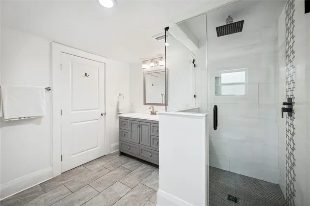 a view of house with a yard