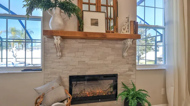 a front view of a house with car parked