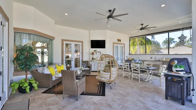 a view of a small yard with wooden fence