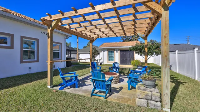 a bedroom with a bed and flat screen tv