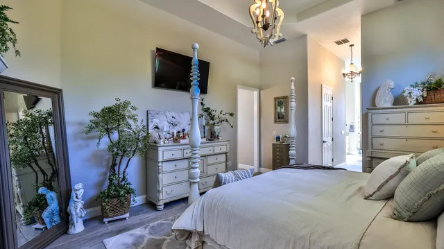 an aerial view of a house with a swimming pool