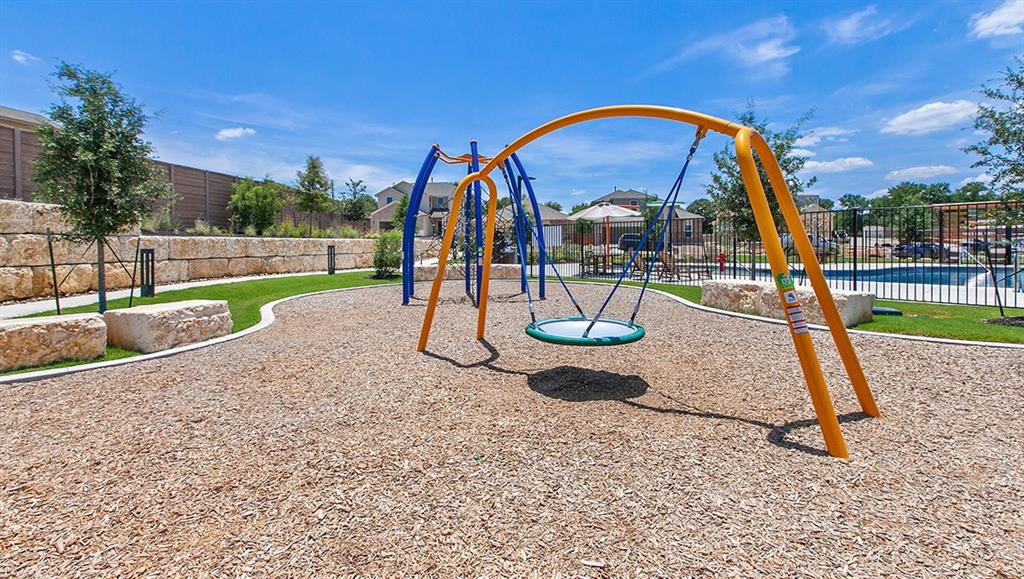 6717 Ranchito Drive Austin, TX 78744 - Photo 25 of 28 View of community play area