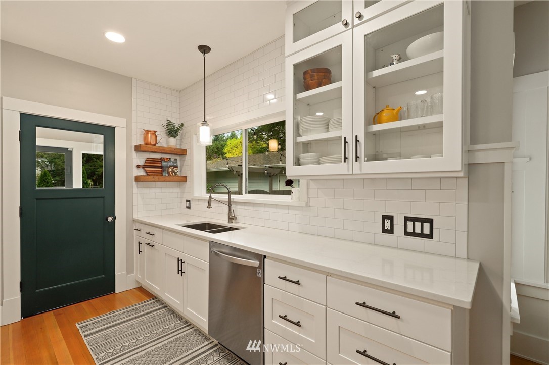 19128 Northeast Redmond Road Redmond, WA 98053 - Photo 11 of 35 a kitchen with a sink and cabinets