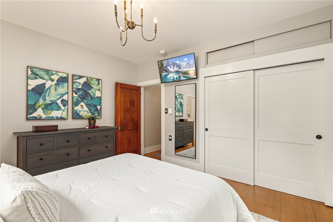 19128 Northeast Redmond Road Redmond, WA 98053 - Photo 16 of 35 a bedroom with a bed dresser and a window