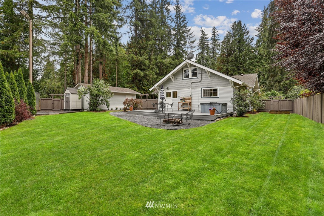 19128 Northeast Redmond Road Redmond, WA 98053 - Photo 25 of 35 a view of a house with backyard and sitting area
