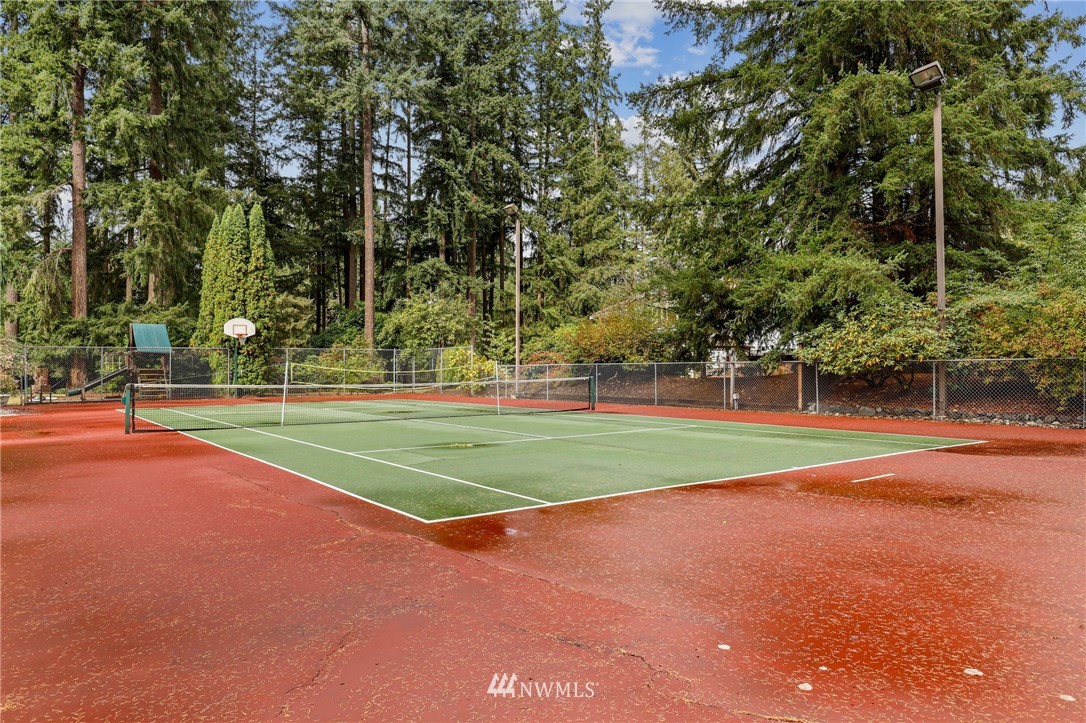 19128 Northeast Redmond Road Redmond, WA 98053 - Photo 30 of 35 a view of a playground with basketball court