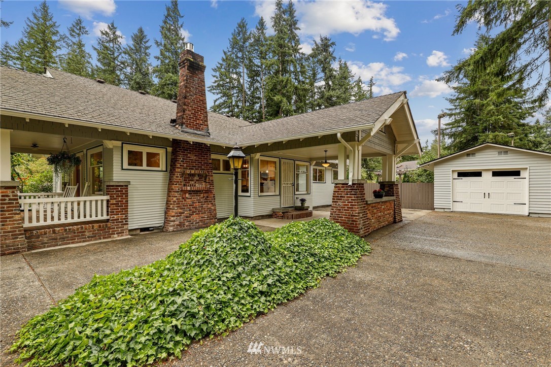 19128 Northeast Redmond Road Redmond, WA 98053 - Photo 32 of 35 front view of a house with a yard
