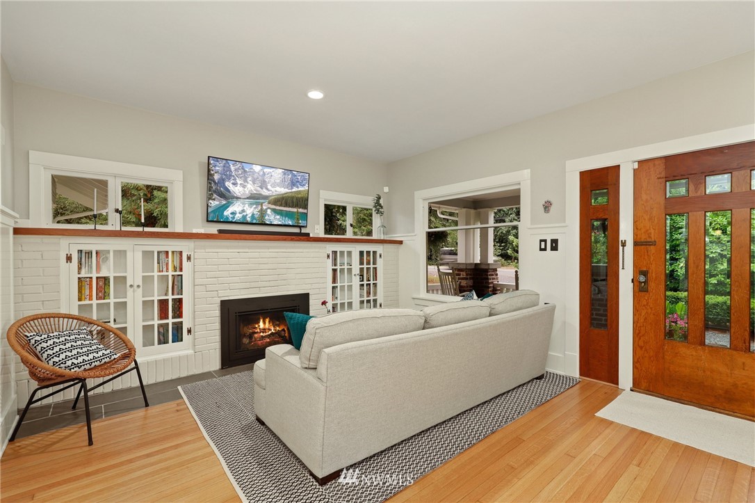 19128 Northeast Redmond Road Redmond, WA 98053 - Photo 5 of 35 a living room with furniture and a fireplace